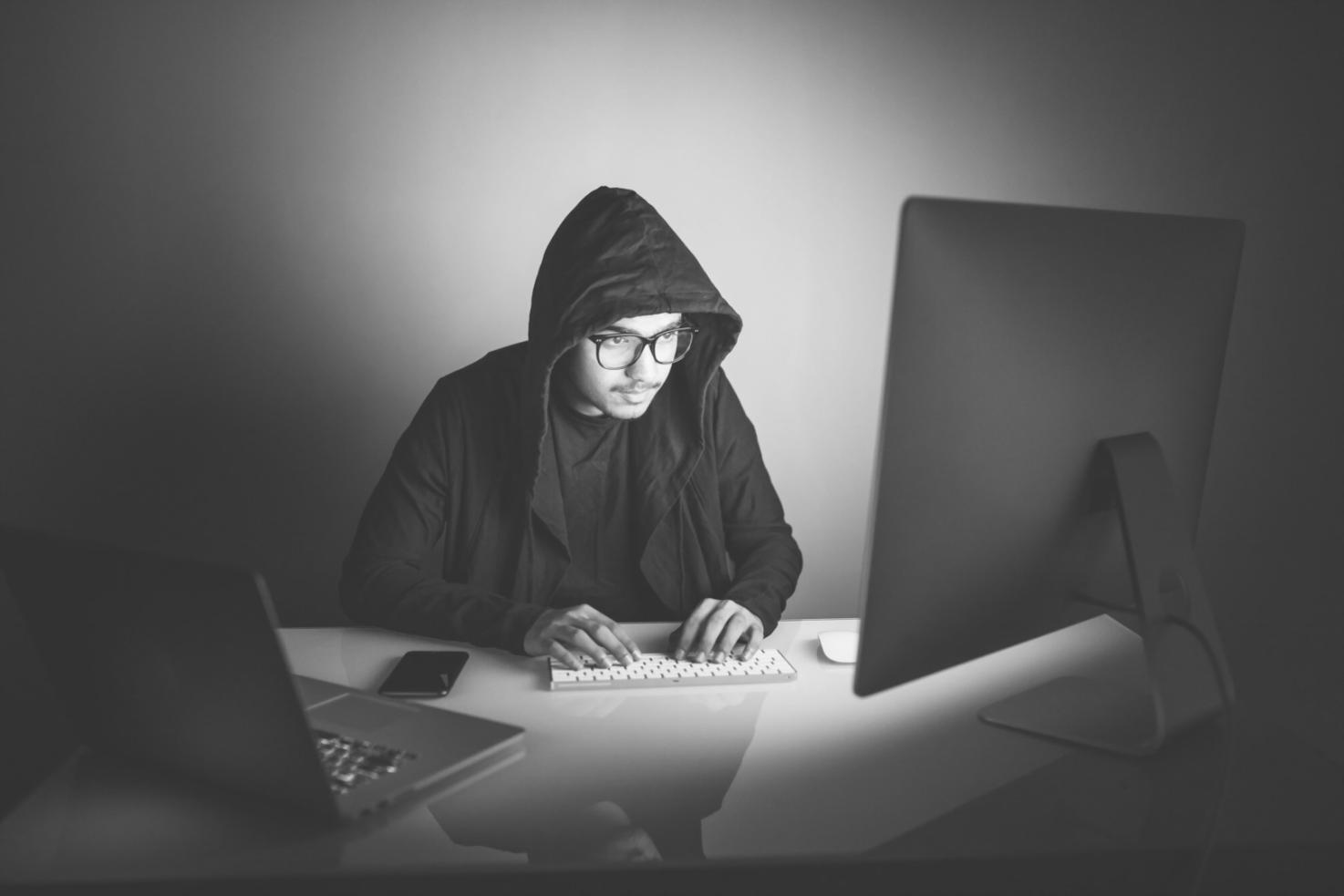 Students collaborating on UX design projects in modern workspace