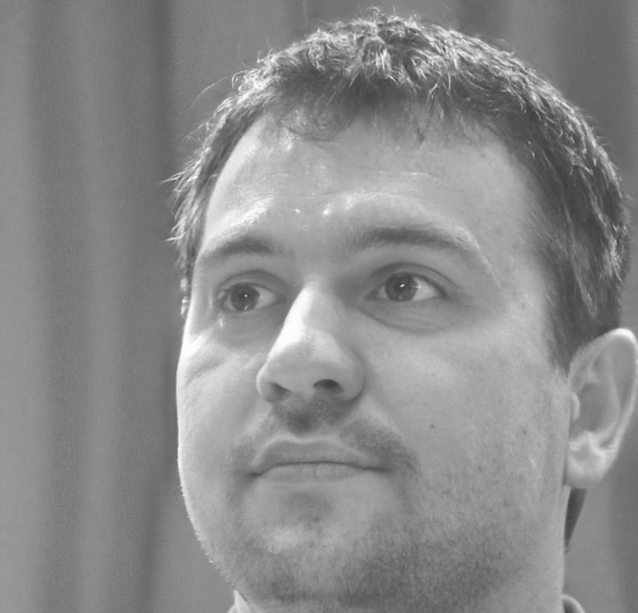 Keiji Nakamura, Program Director at DatCore, reviewing student design work